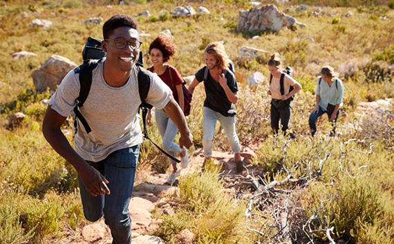 Group Hiking up Path Beautiful Outdoors Not affect by Climate Change