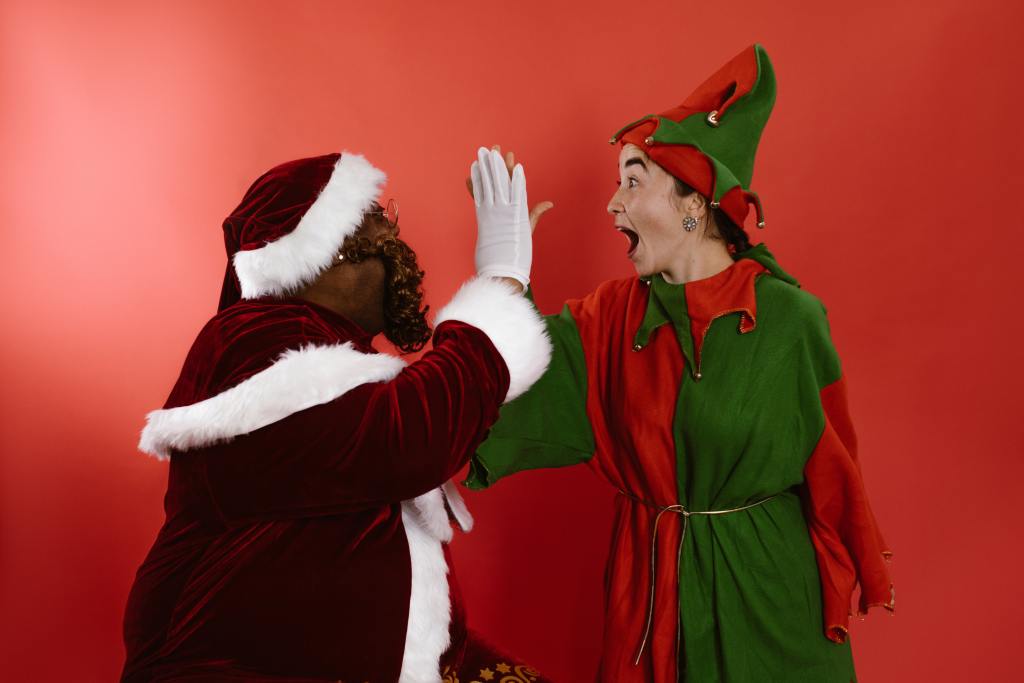 A Person Wearing a Santa and Elf Costume