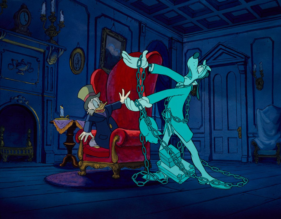 goofy as jacob marley haunting scrooge mcduck. marley is a blue ghost with rattling chains in mickey’s christmas carol