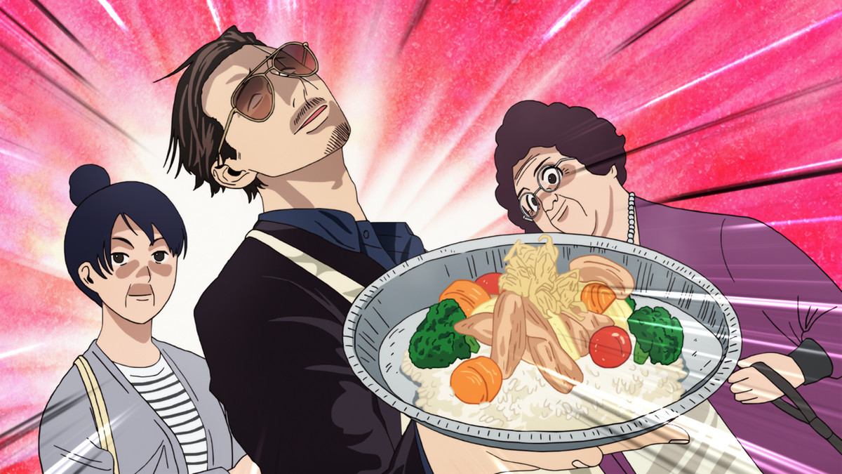 “Immortal Tatsu,” the legendary yakuza, holding a plate of food dramatically in The Way of the Househusband