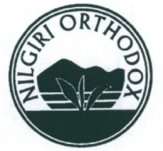 Cirtificatieteken voor Nilgiri-orthodoxe thee. Het toont een groeiend theeblad in het midden met de woorden "Nilgiri Orthodox" eromheen in halfrond formaat.