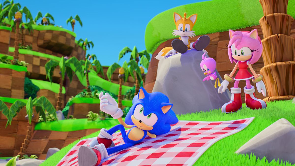 Sonic loungen op een picknickmand in de groene heuvelzone met staarten en amy in Sonic Prime