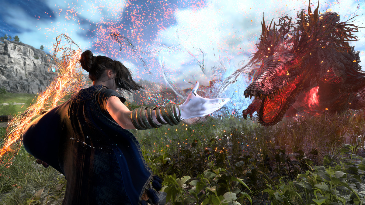Frey, một phụ nữ trẻ, triệu hồi một câu thần chú trên cánh đồng xanh, đối mặt với một con quái vật giống rồng, màu đỏ, đang lao tới