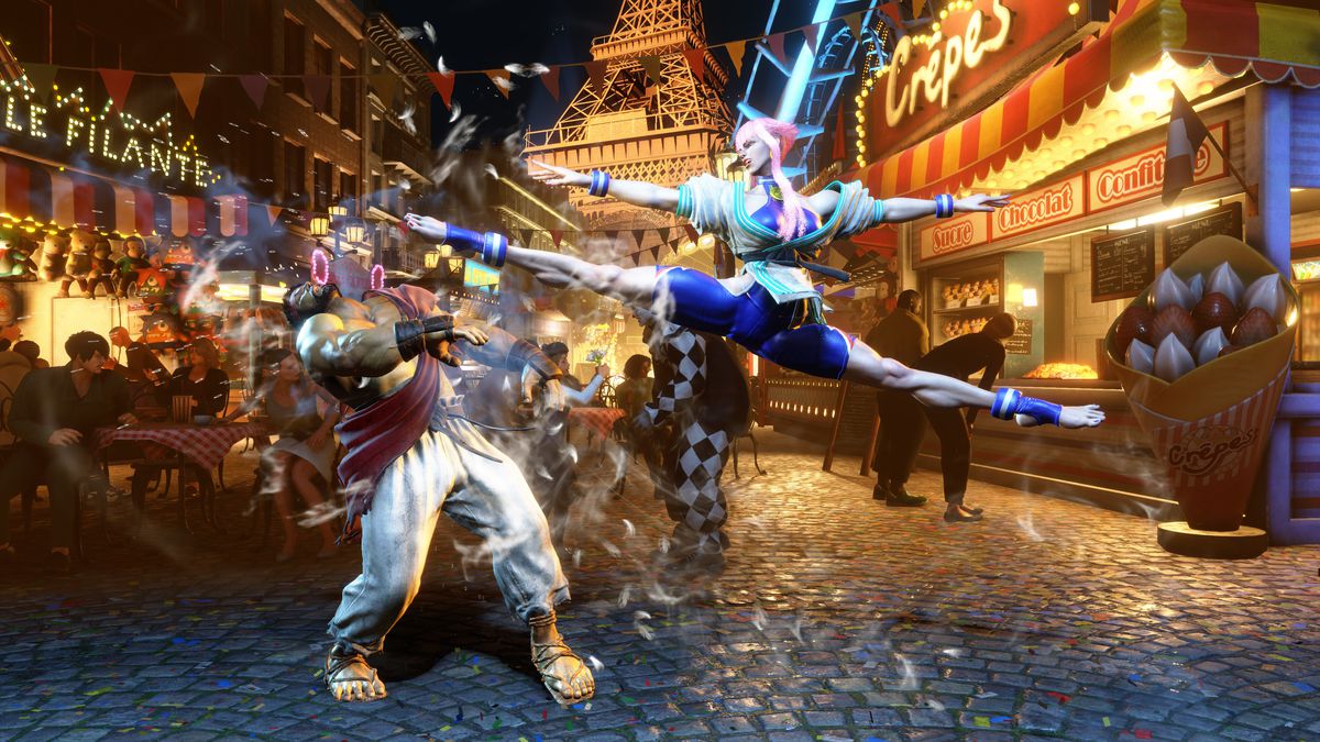 Manon, một võ sĩ mới trong Street Fighter 6, đá vào mặt Ryu trên đường phố Paris vào ban đêm, với tháp Eiffel và quầy bánh crepe ở phía sau