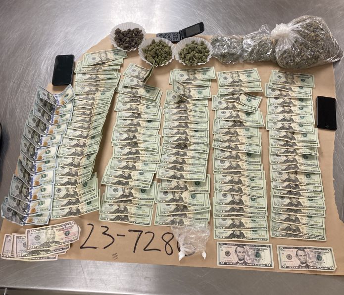 Washington County Wisconsin driver stuck in snow drug bust found with pound and a half of marijuana calls deputies