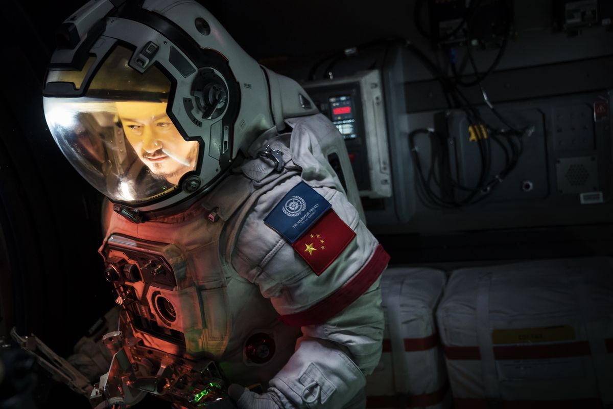 Wu Jing as Liu Peiqiang in his astronaut suit in The Wandering Earth.