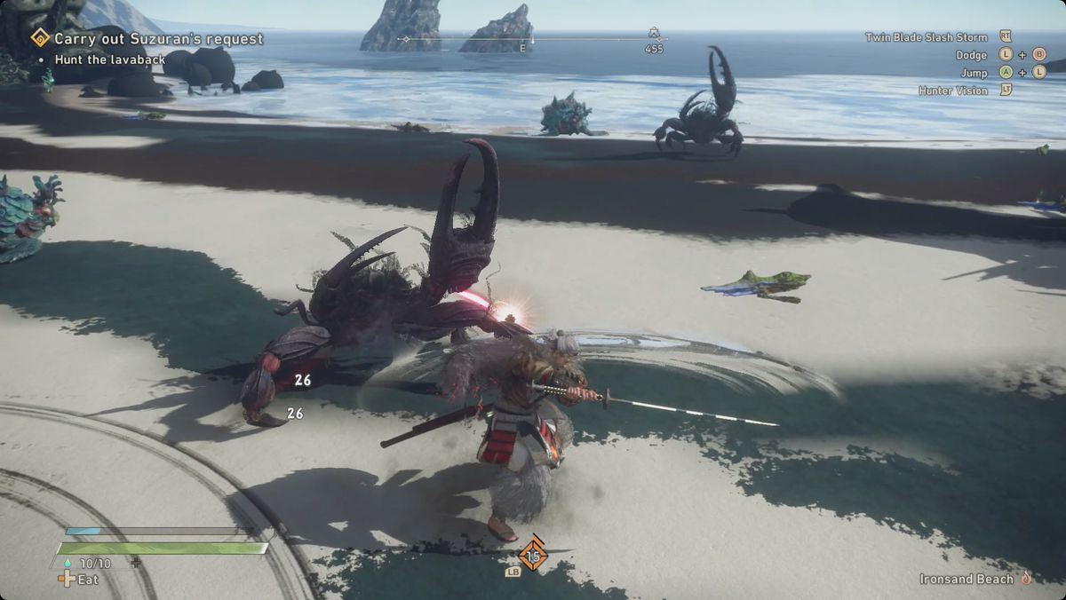 A Wild Hearts hunter attacking a giant crab on a beach.
