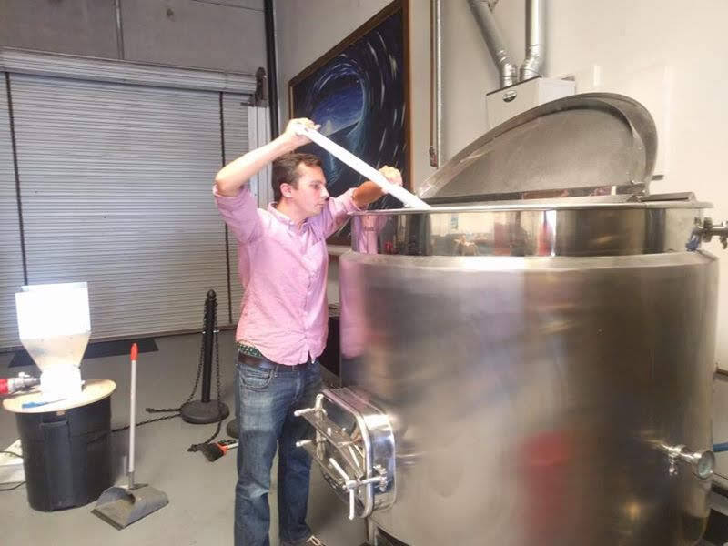 Dmitri brewing beer at a brewery