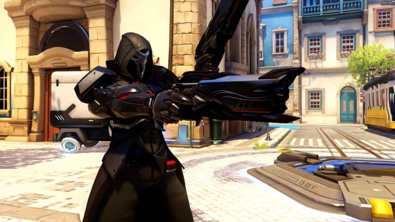 The Overwatch 2 hero, Reaper, holds his gun at the ready