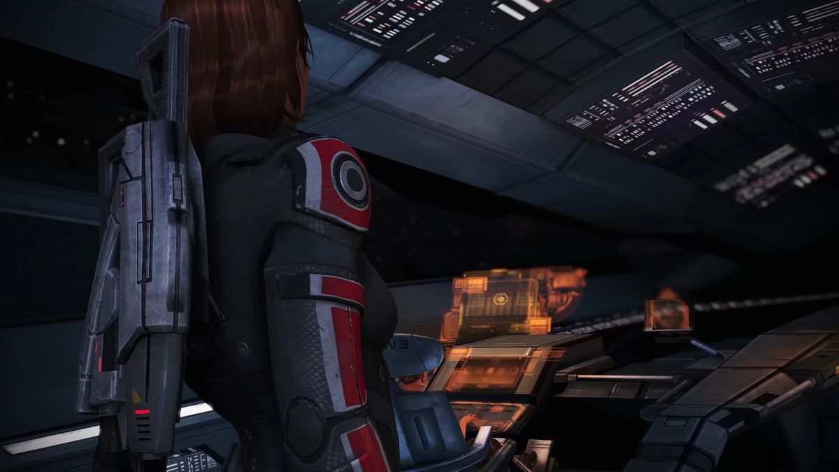 Commander Shepard faces a ship dashboard in Mass Effect: Legendary Edition.