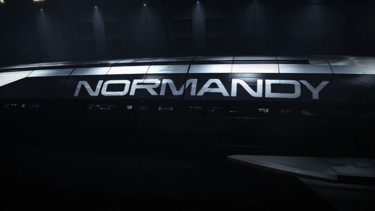 A side shot of a space ship that clearly reads Normandy, from Mass Effect: Legendary Edition
