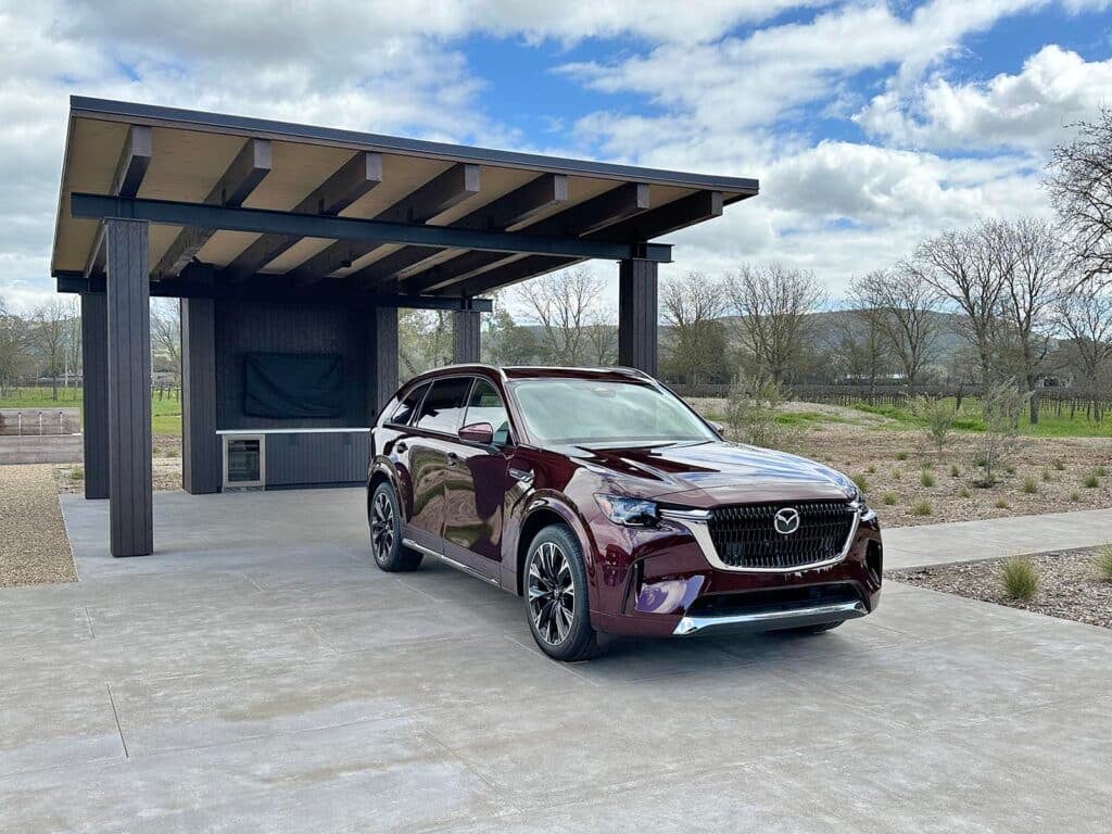 Mazda made a point of showing off the 2024 CX-90 in its new signature hue, Artisan Red.