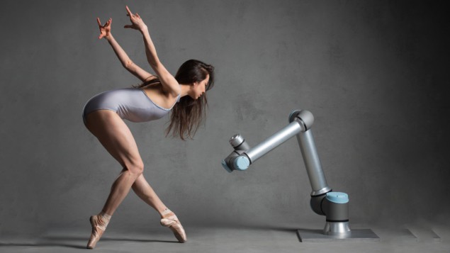 Merritt Moore dancing with a robot
