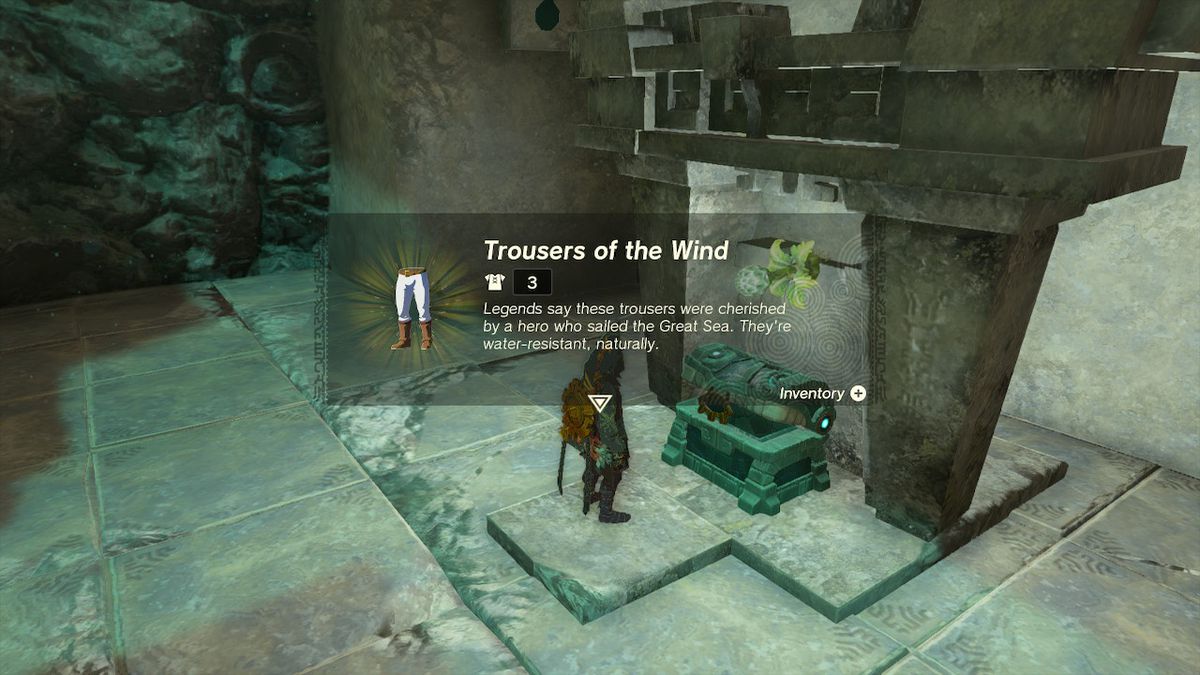 Link, Zelda Tears of the Kingdom'da Depths'te rüzgarın pantolonunu içeren bir sandık açar.