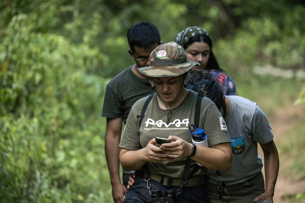 Tatiana Gallupi leading a youth group to do bird monitoring in the Ybytyrusu mountain range, in southwest Paraguay.