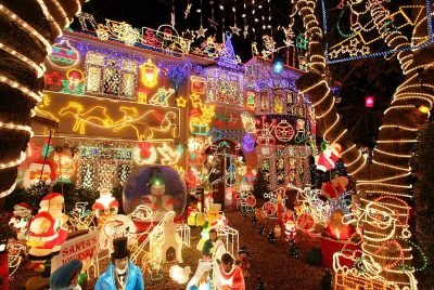 Exterior of home with absurd amount of Christmas lights.