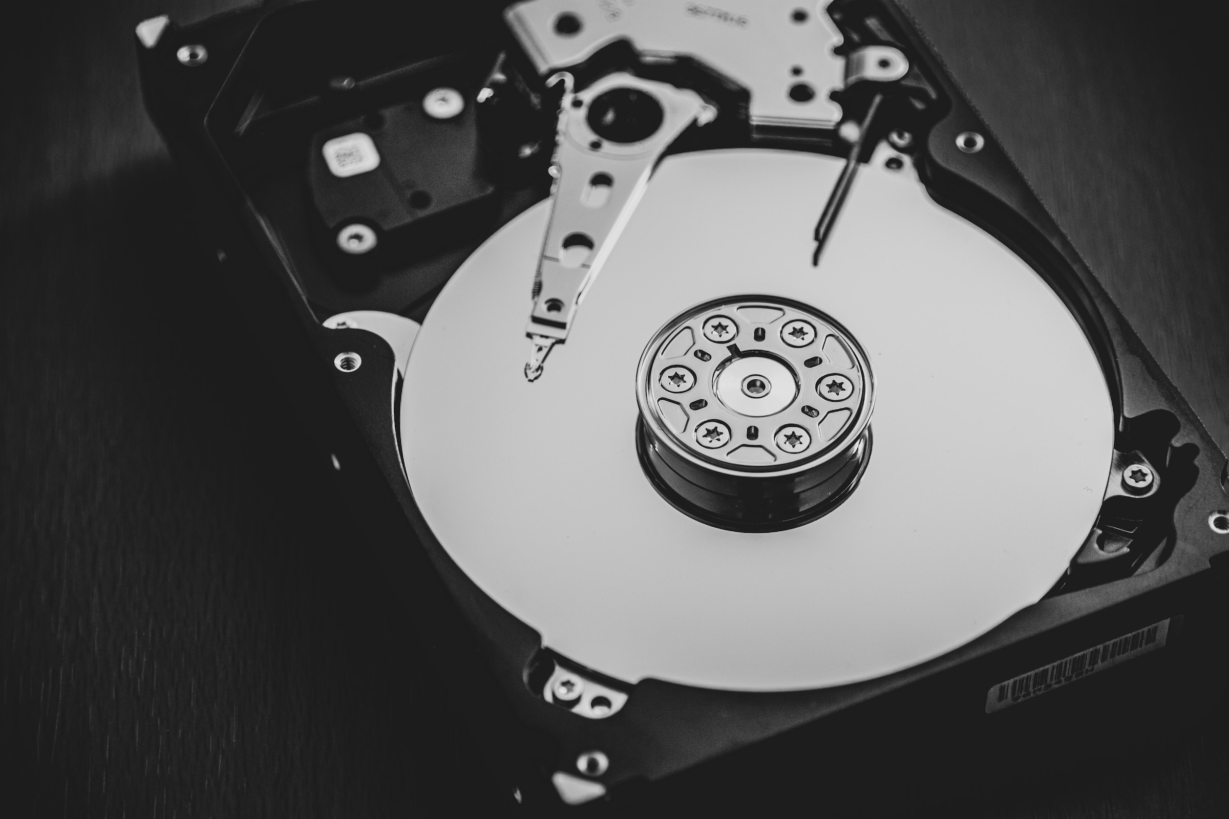 black and white photo of an exposed hard drive