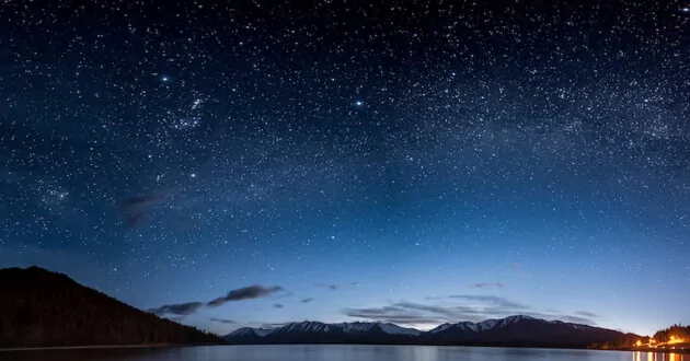 Panoramic image of the night skies at Lake Tekapo, an area well known for its clear night skies, Tekapo, New Zealand