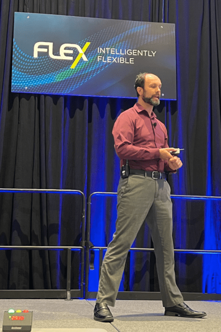 Kris Erickson, the research manager at Meta Reality Labs, talks about additively manufactured electronics (AME) at FLEX Con on Monday July 11, 2023. Source: Semiconductor Engineering / Susan Rambo