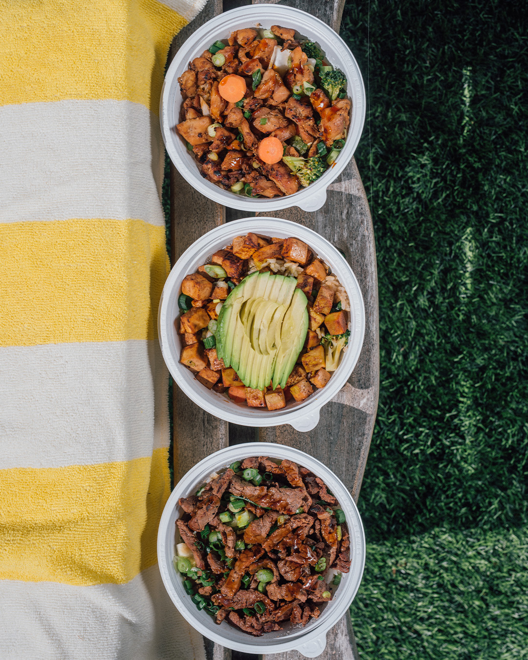 Three rice bowls with meat, vegetables and avocado - The Flame Broiler Menu