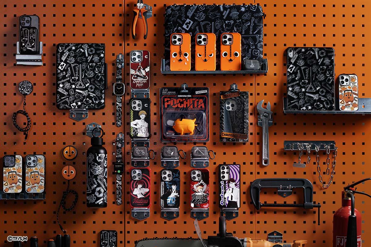 A stock photo displaying the entire lineup of Chainsaw Man mobile accessories from Casetify on an orange pegboard