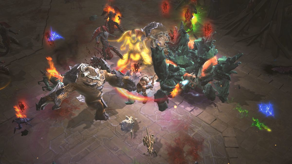 A Barbarian battles a horde of powerful, colorful monsters in Diablo 3