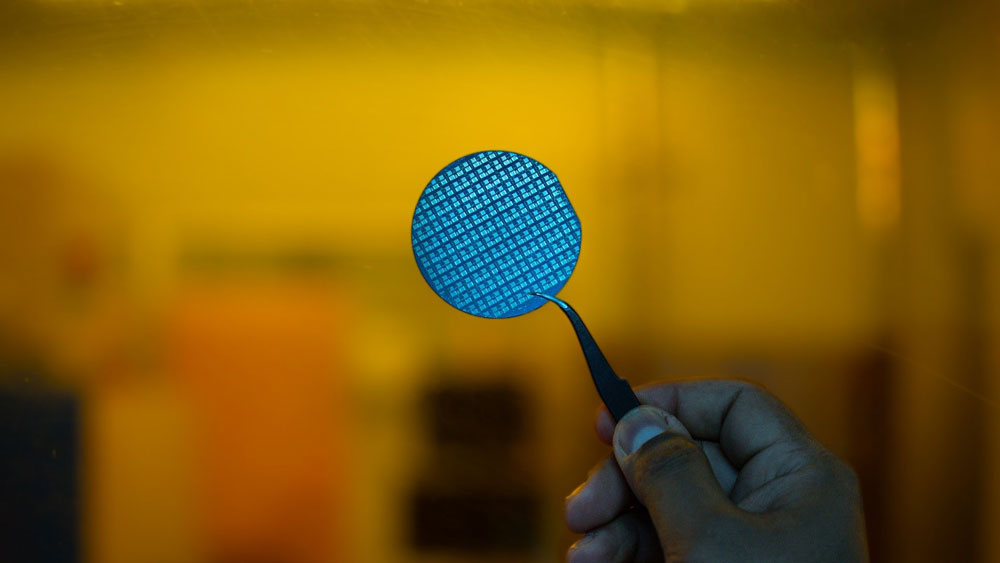 Two-inch GaN-on-silicon wafer with power transistors, developed at IISc’s CeNSE (photo: Ashutosh Vishwakarma).