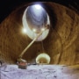 Süperiletken Süper Çarpıştırıcı için kazılmış, içinde makineler ve insanlar bulunan boş tünel