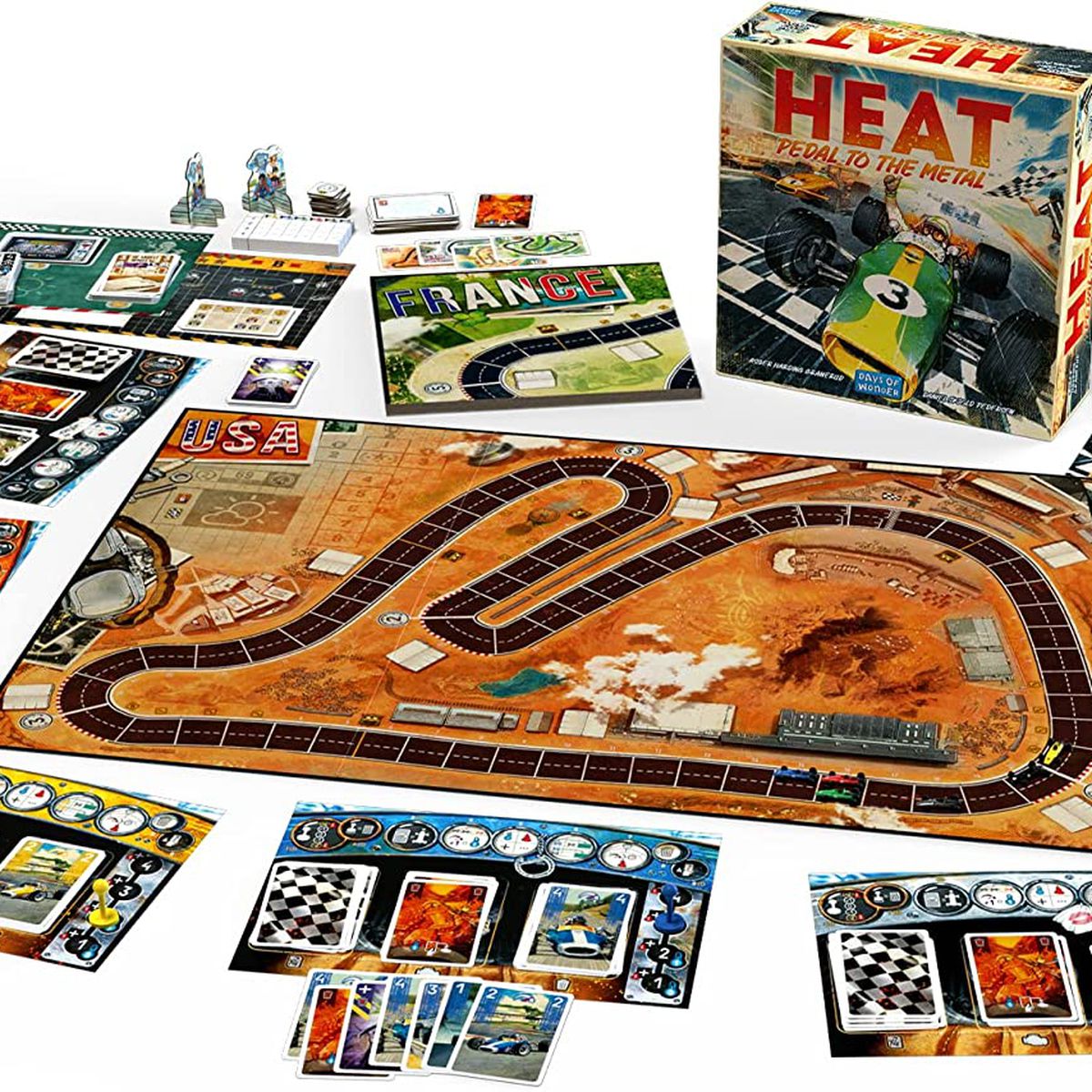 The component for Heat, including a modular track and plastic cars, laid out for display.