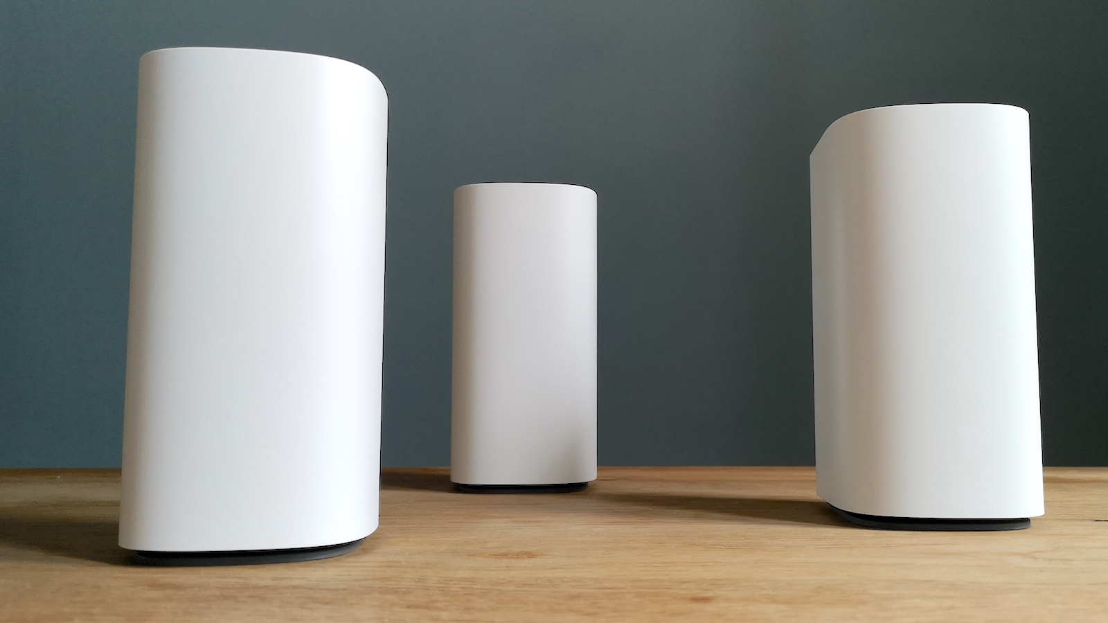 Three Linksys Velop Pro 6E mesh Wi-Fi units viewed from the front