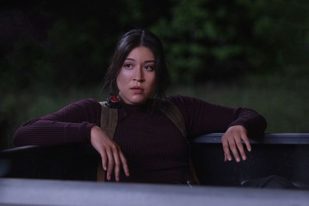 Maya Lopez (Alaqua Cox) sits in the back of a truck looking at something