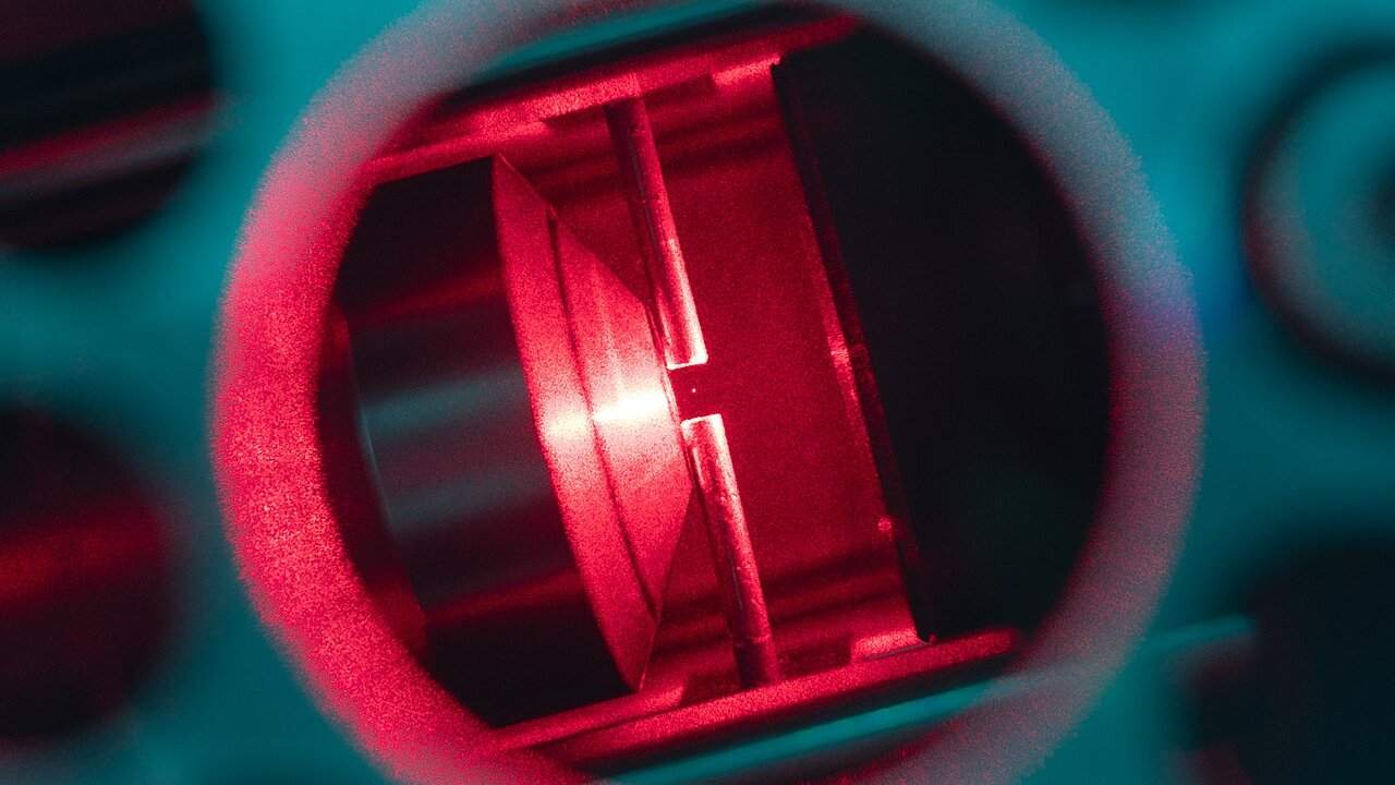 Optical tweezers, shown here trapping a nanoparticle