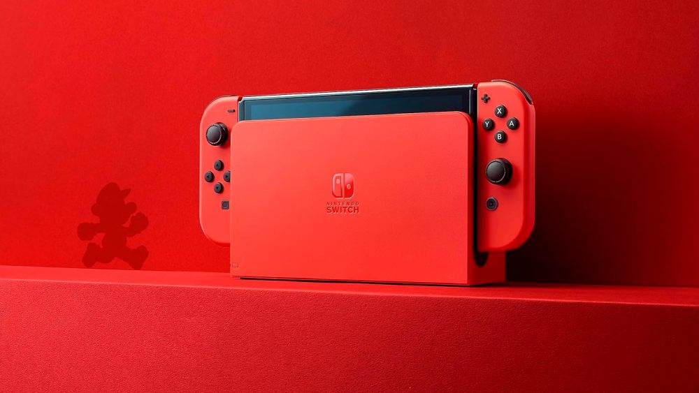 Nintendo Switch OLED met Mario Shadow op de achtergrond