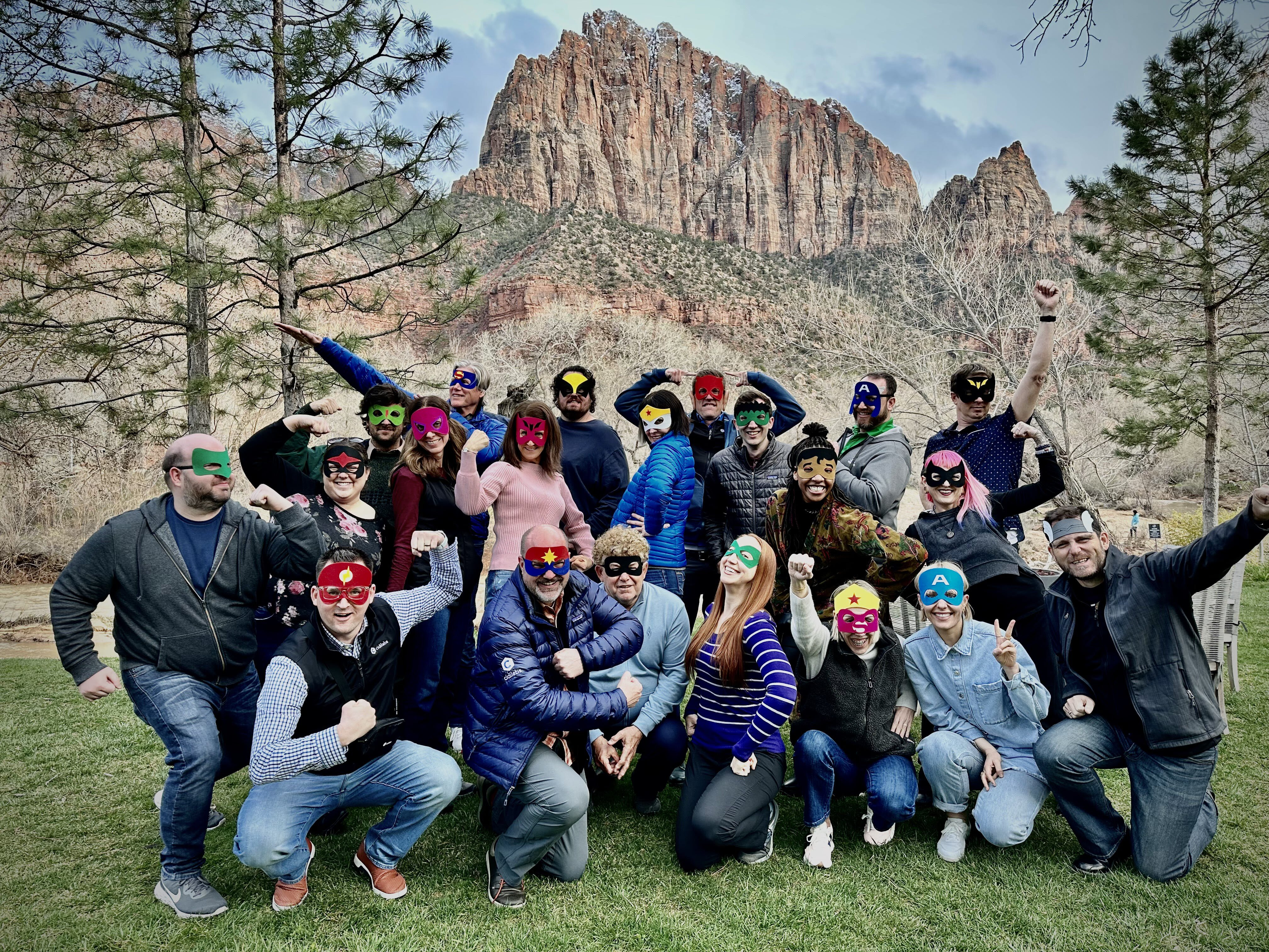group of Cidi Labs employees with masks on a retreat
