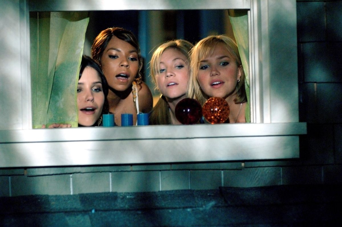 The four women of John Tucker Must Die crowd together in a small window
