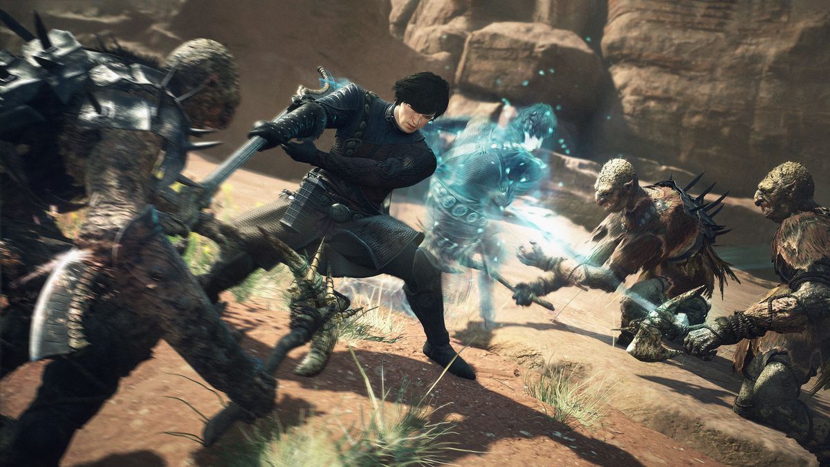 A dark-haired male mystic spearhand Arisen slashes at a trio of goblins in a screenshot from Dragon’s Dogma 2