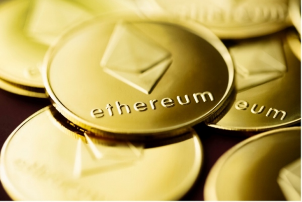 gold coins with ethereum logo
