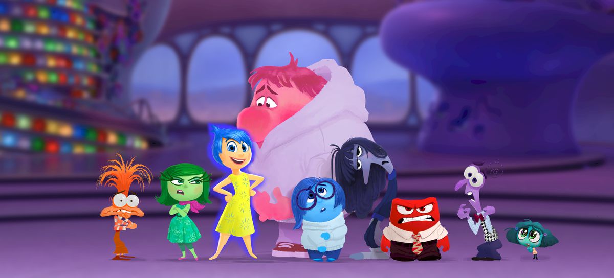 Concept art showing the full lineup of emotions in Inside Out 2: Anxiety, an orange muppet-like figure; Disgust, a small green female; Joy, a yellow smiling figure; Embarrassment, a huge, hulking pink figure; Sadness, a round and blue figure; Ennui, a drooping indigo figure; Anger, a red block; Fear, a twisty purple figure; and Envy, a turquoise blob.