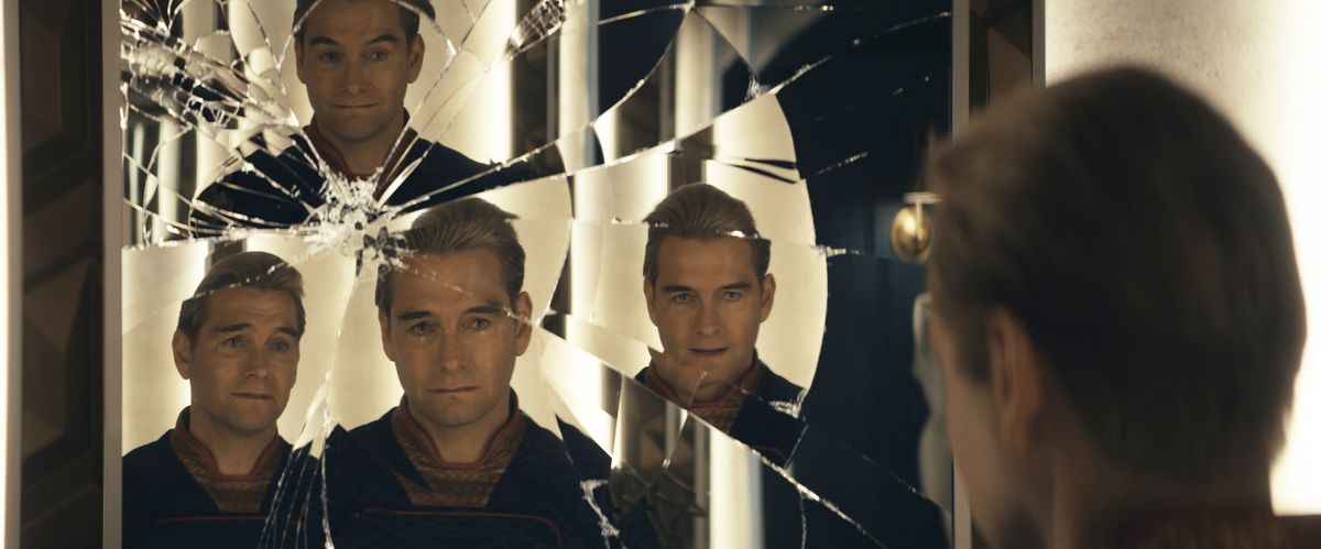 Homelander looks at multilple reflections in a shattered mirror in The Boys season 4