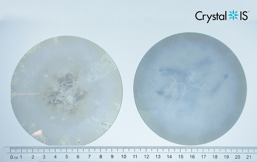 Comparison of Crystal IS 100mm bulk AlN substrate from Q1/2024 (left) with 90% usable area and Q2/2024 (right) with 99.3% usable area.
