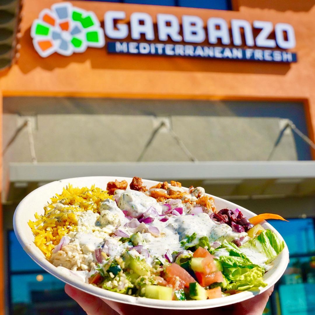 plate filled with food with the Garbanzo brand quality