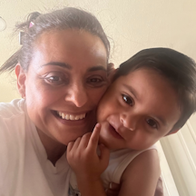 Caregiver Miriam Bravo with her grandson Tadeo