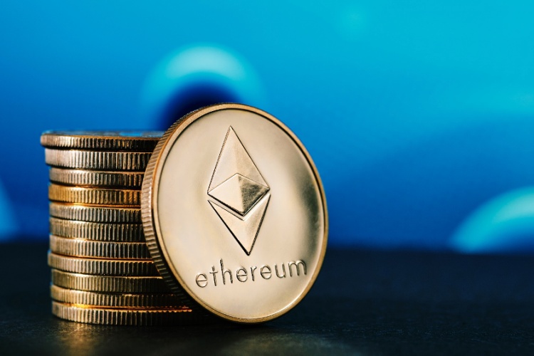 stacked coins labeled with ethereum logo